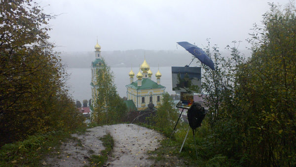 Plein air landscape painting in heavy persistent rain in Plyos, Russia